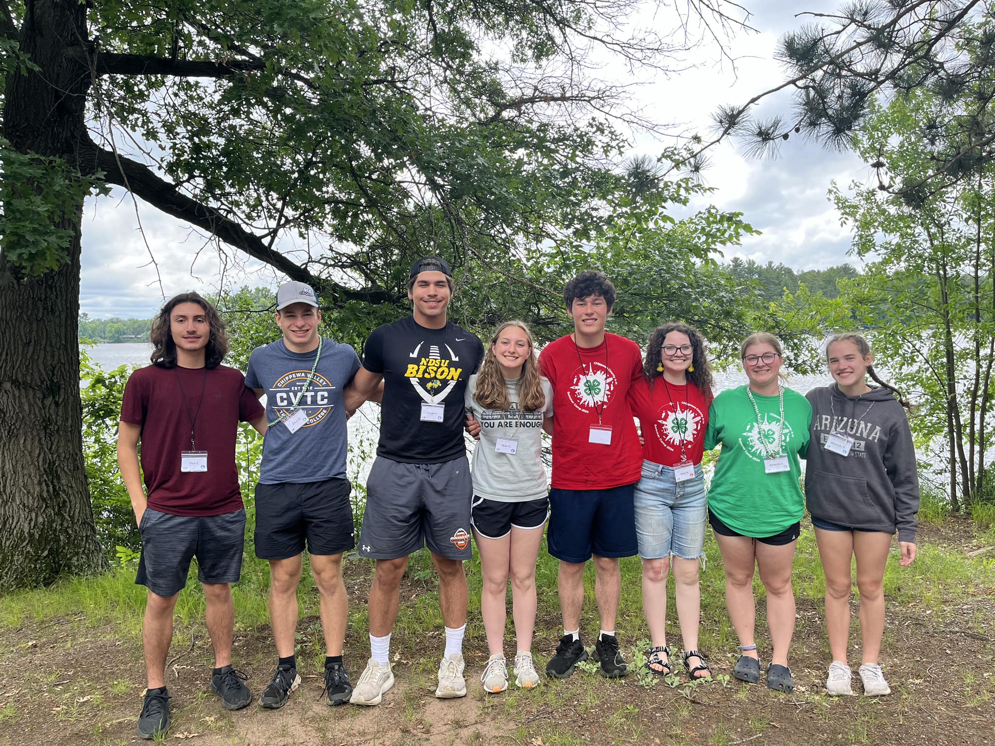 Image of 8 counselors at camp