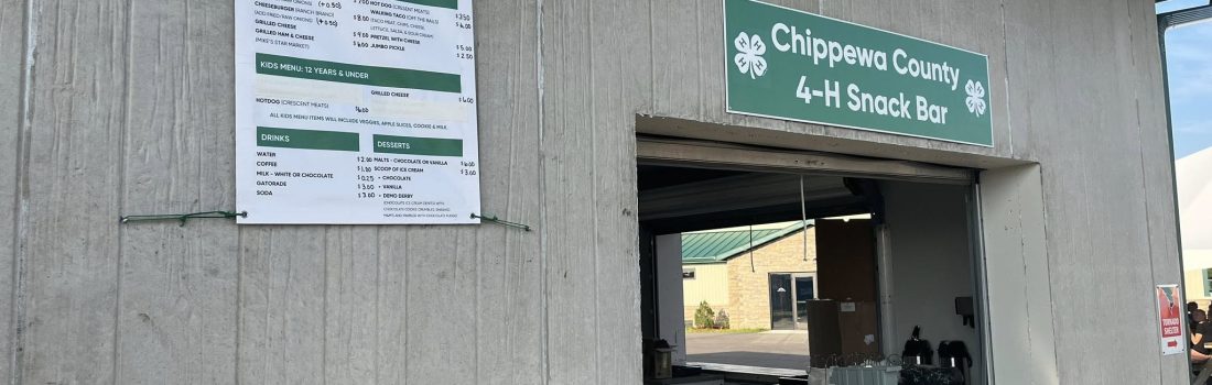 Image of Snack Bar with window opening and green 4-H banner over the window