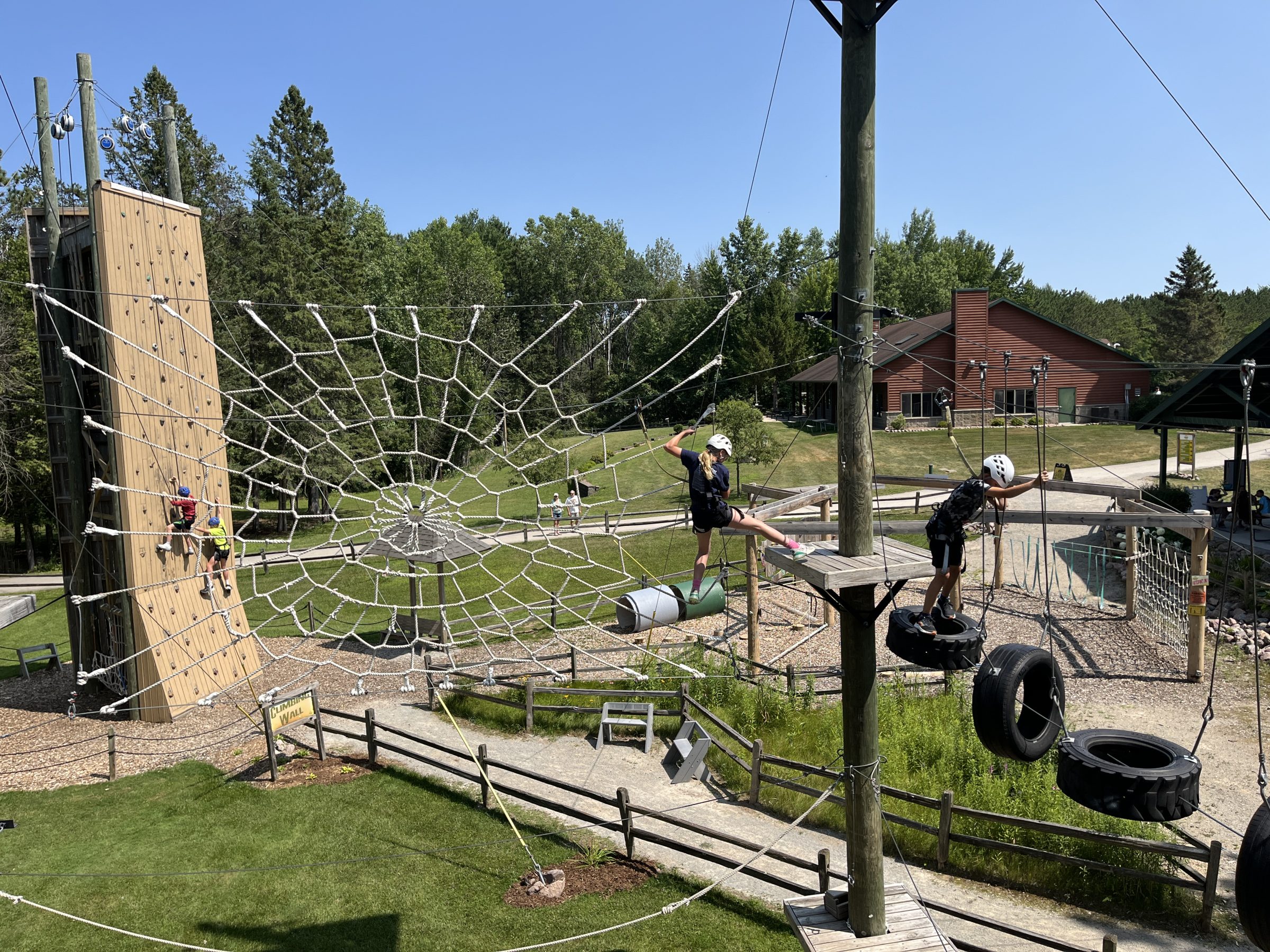 4-H participant on ropes course